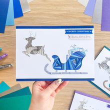 Load image into Gallery viewer, Santa&#39;s Sleigh with Reindeer Aperture Card (Pack of 3) | 3 x Square PRINTED Christmas Apertures, Coloured Card Blanks &amp; White Envelopes | Night Sky Edition | Blue Purple Teal
