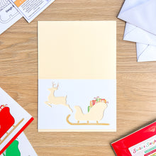 Load image into Gallery viewer, Santa&#39;s Sleigh with Reindeer Aperture Card (Pack of 3) | 3 x Square PRINTED Apertures, Coloured Card Blanks &amp; White Envelopes | Traditional Christmas Edition | Red Green Gold
