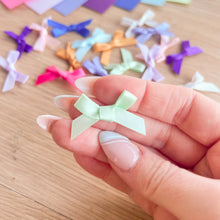 Load image into Gallery viewer, Ribbon Bow Craft Embellishments 6-7mm wide | Silver Gold Green Red Multicoloured | 20 per pack
