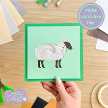 Load image into Gallery viewer, white iris fold sheep on green card
