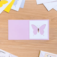 Load image into Gallery viewer, butterfly aperture cut-out on lilac card blank
