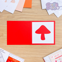 Load image into Gallery viewer, Toadstool aperture on red card
