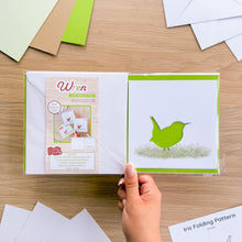 Load image into Gallery viewer, Wren Card Aperture Pack in packaging with wren cutouts on card blanks. Envelopes and iris fold pattern and guide included in pack.

